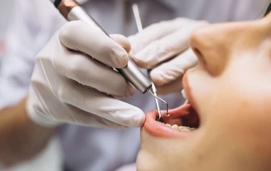 Persons teeth being examined